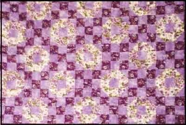 seasonal 9 patch quilt sewin in purple fabrics